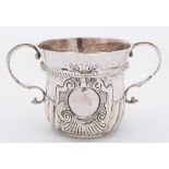 A Queen Anne Britannia standard silver porringer, makers mark worn ?O with pellet below,