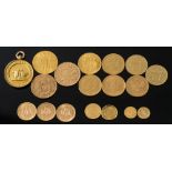 A Swiss twenty francs, sixteen various gold coins and a 15ct gold medallion:.
