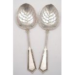 A pair of Victorian Dutch silver serving spoons,