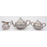 A late 19th/early 20th century Chinese silver three piece tea service, maker WHL,