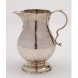 A George II silver sparrow beak cream jug, maker's mark illegible, London,
