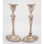 A pair of Edward VII silver candlesticks, maker West & Sons, London,