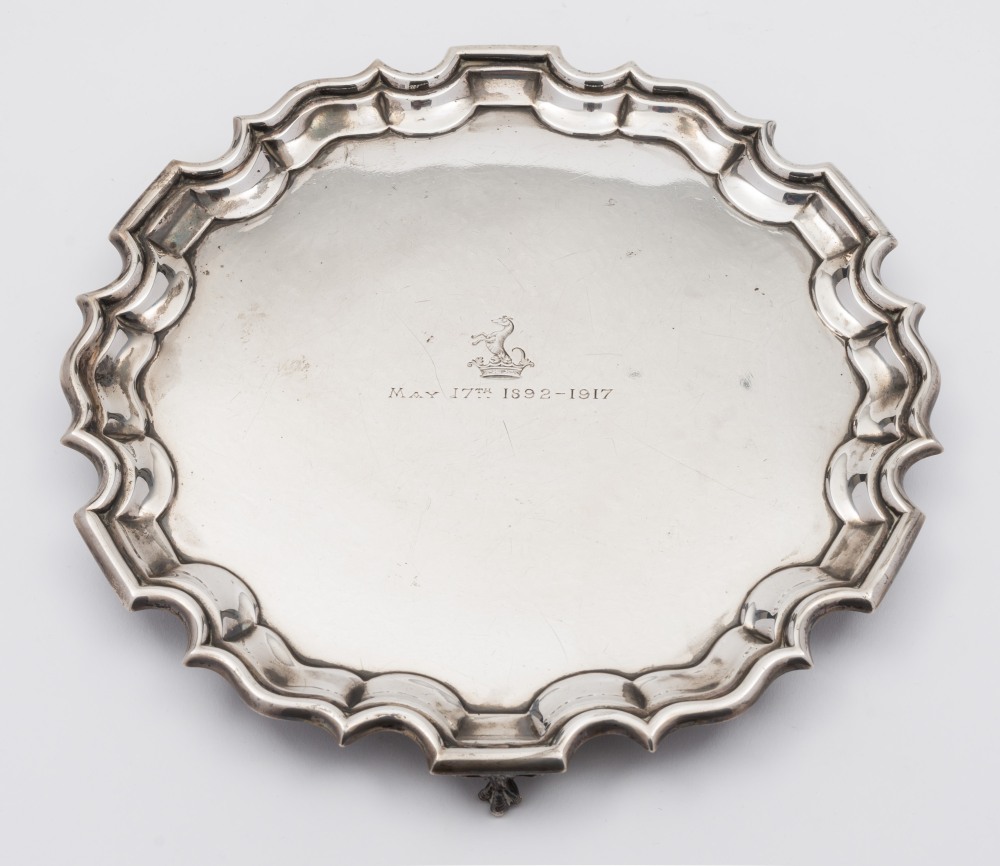 A George V silver salver, maker Travis Wilson & Co Ltd, Sheffield, 1916: crested and dated,