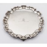 A George V silver salver, maker Travis Wilson & Co Ltd, Sheffield, 1916: crested and dated,