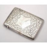 An Edward VII silver card case, maker J.