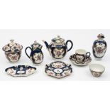 A Worcester (First Period) part tea and coffee service: painted with floral sprays within gilt