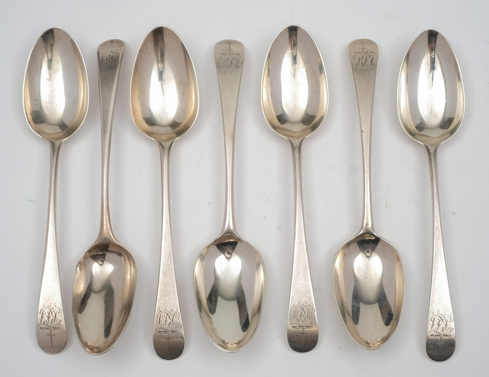 Seven George III silver Old English tablespoons, various makers and dates:, crested and initialled,