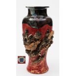 A Japanese Sumida pottery dragon vase: of baluster form, the neck and rim with mottled brown,