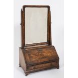 An 18th Century walnut and crossbanded swing frame toilet mirror:,