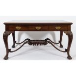 By Edwards & Roberts - A late 19th Century mahogany partners library table:, in the George II taste,