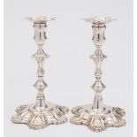 A pair of George II cast silver candlesticks, maker John Cafe, London,