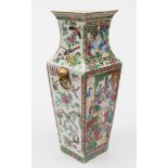 A Canton porcelain vase: of shouldered square profile with lion mask and ring handles,