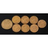 Seven half-sovereigns and a George III guinea:.