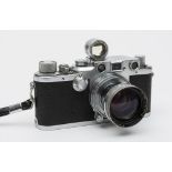 A Leica III 35mm camera, serial No 428583: with Summitar f = 5cm.