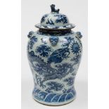 A Chinese porcelain 'dragons' jar and cover: the jar of baluster form with four mask handles