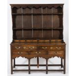 An 18th Century oak dresser:, of small size,