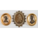 An early 19th Century miniature bronzed silhouette of a lady:-, head and shoulders wearing a turban,