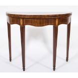 An early 19th century mahogany and inlaid half round tea table:,