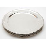 Ten Mexican Sterling silver dinner plates: of plain circular form with wavy edge borders,