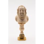 A 19th century carved ivory desk seal: in the form of an Elizabethan gentleman with curly hair and