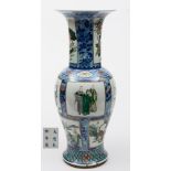 A Chinese porcelain yen yen vase: decorated in under glaze blue and famille verte enamels,