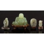 Three Chinese jade carvings and a hardstone figure of Budai: the first of two bean pods with