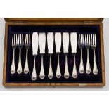 A set of six Edward VII fish knives and forks, maker Francis Higgins II, London, 1904: initialled,