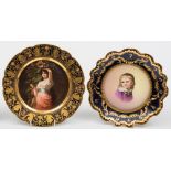 Two Vienna-style porcelain plates: one painted with a portrait of a girl titled 'Sonnenblumen',