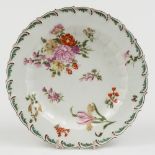 A Chelsea porcelain plate: of circular form with feather moulded rim enamelled in colours with