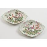 A pair of Chelsea porcelain dishes: of navette form each decorated in colours with fancy birds in a