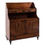 An unusual late George III mahogany and inlaid low graduated bookcase/writing desk:,