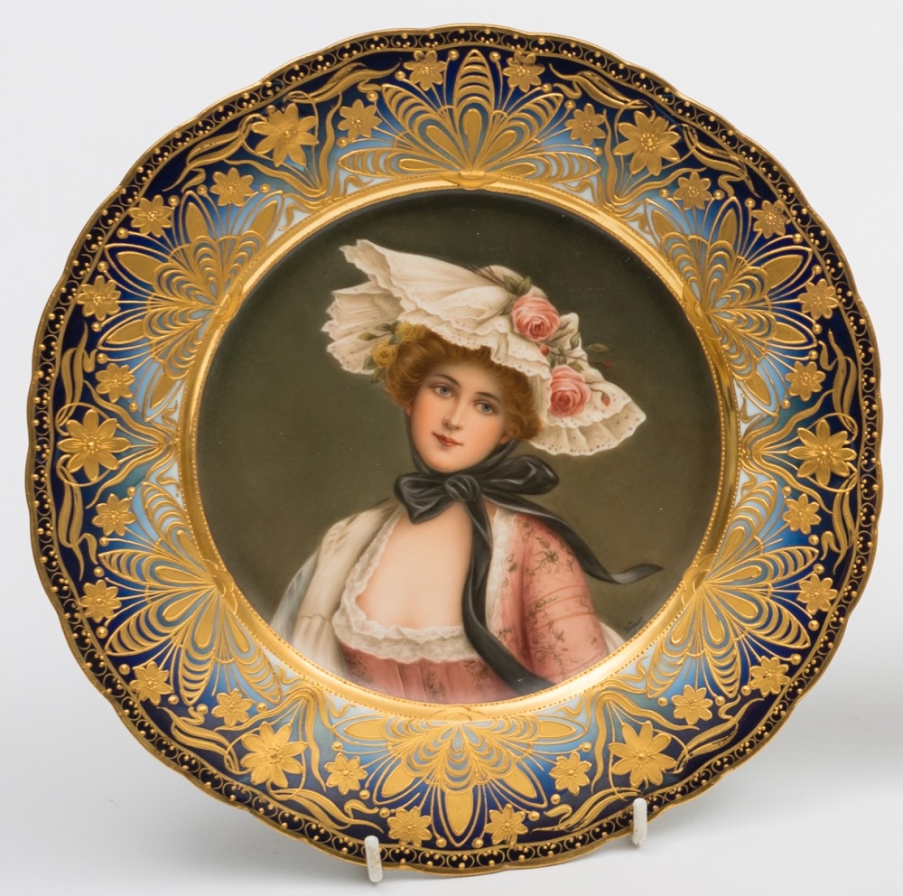 A Vienna-style porcelain plate: painted with a portrait of the 'Queen of the Roses',