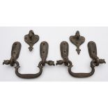 A set of 19th century Persian bronze door furniture: comprising two loop handles with clasps and