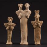 A group of three Syro/Hittite terracotta idol figures: comprising a double headed and two single