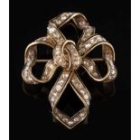 A 19th century enamelled gold and diamond mounted ribbon bow brooch:,