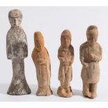 A group of four Chinese pottery standing figures: of three ladies and one man,