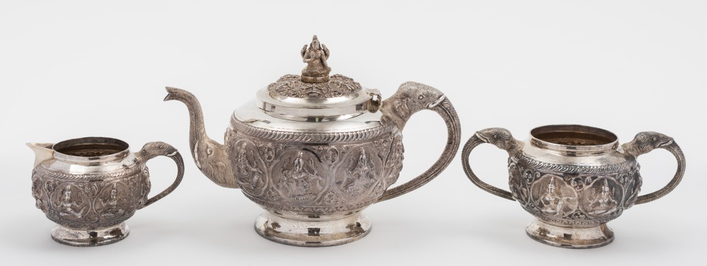 An Indian silver three-piece tea service: of circular outline,