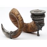 A ram's horn and electro-plate mounted inkwell: the circular well with hinged lid decorated with