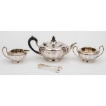 A George V silver matched three-piece tea service, maker Elkington & Co, Birmingham, 1909, 1912,