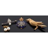 An 18ct gold and diamond mounted 'bird' brooch:,