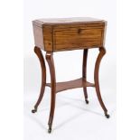 A Regency mahogany and inlaid teapoy of sarcophagus shape:, bordered with ebonised lines,