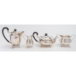 A 20th century matched four-piece silver tea service, maker Walker and Hall, Sheffield,