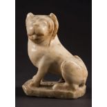 An Indian polychrome decorated carved white marble lion,