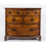 An unusual Regency mahogany and inlaid bow fronted cellarette chest:,