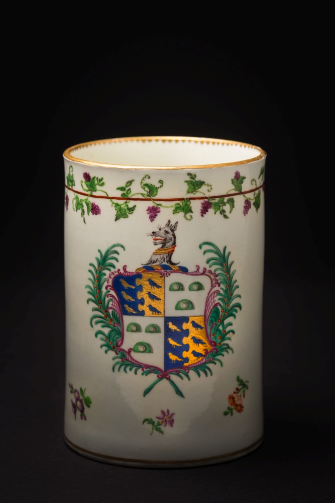 A Worcester [First Period] armorial mug: of cylindrical form with grooved loop handle,