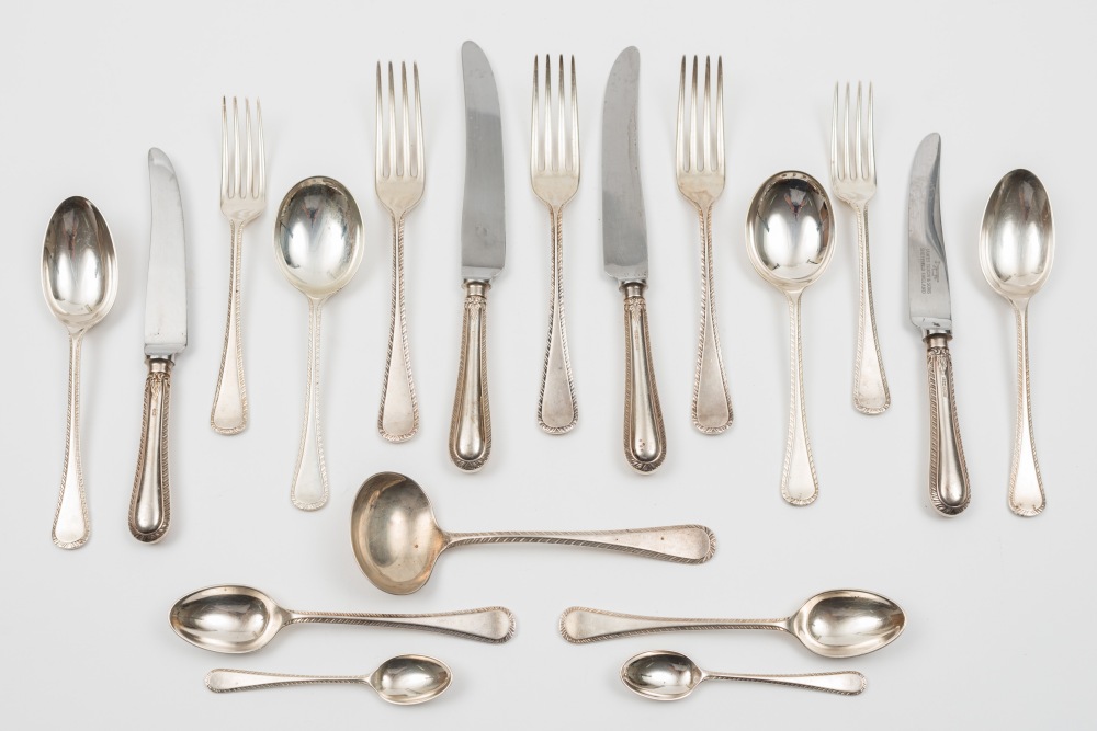 An Elizabeth II silver Hanoverian and feather pattern part flatware service,