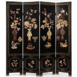 A Chinese hardstone and soapstone decorated black lacquer four-fold screen: with mother of pearl