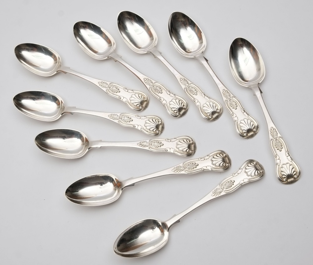 A set of nine Victorian Kings pattern silver teaspoons, maker George William Adams, London, 1865: 5.