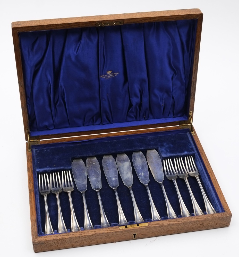 A cased set of George V silver fish knives and forks, maker Atkin Brothers, Sheffield,