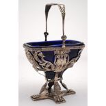 A 19th century German silver swing-handled basket: of rectangular outline with canted corners,